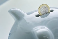 bigstock-blue-piggy-bank-and-an-euro-fa-17169974resized