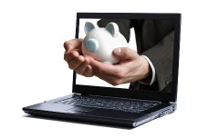 bigstock Hand giving a piggy bank throu resized